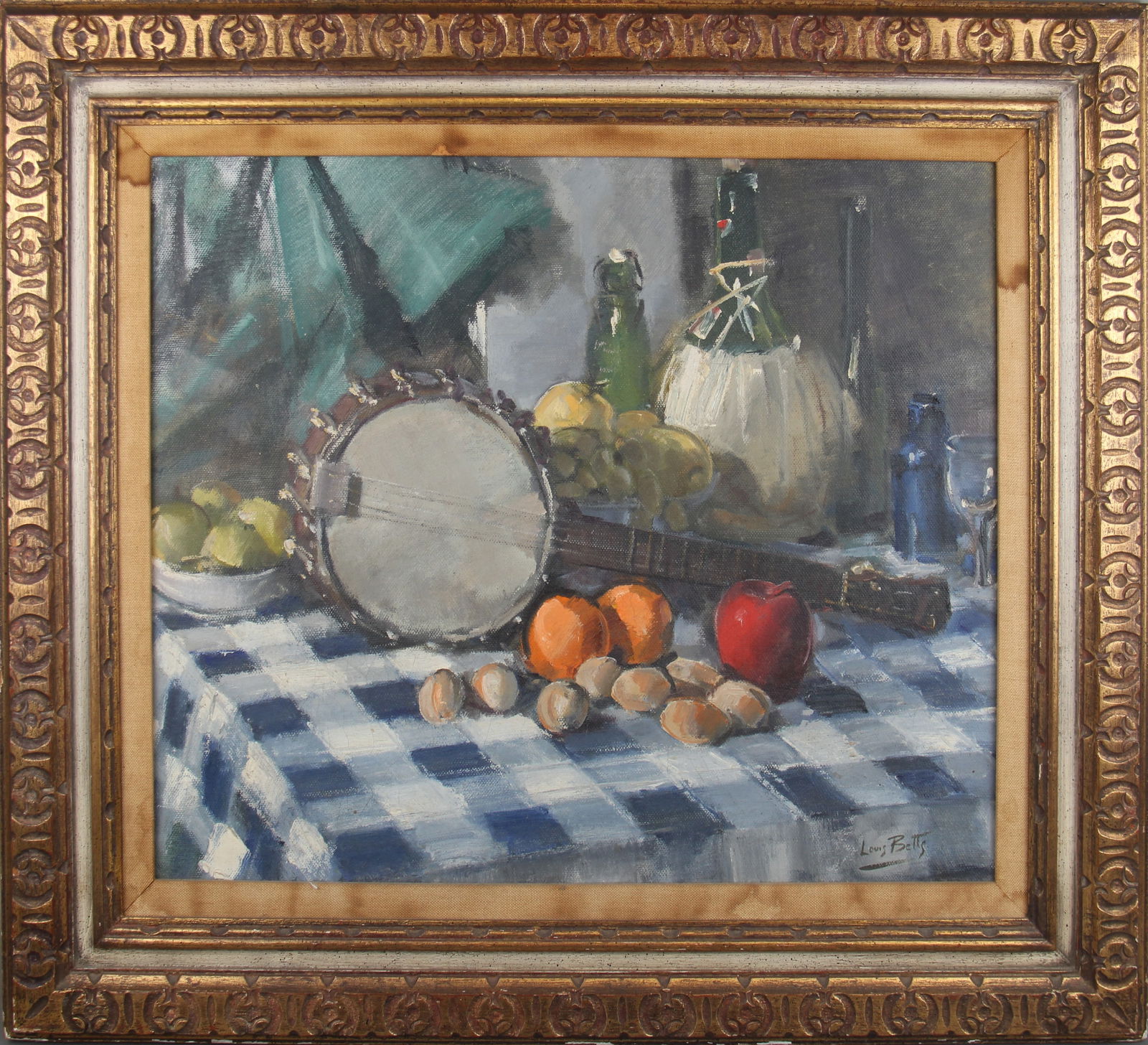 Louis Betts, "Still Life" Oil on Board Painting: Offered is an oil on board painting by Louis Betts (American, 1873-1961). Signed lower right. Great still life image of fruit on a table with a banjo. Sight seen approx. 23-1/4" x 19-1/4", overall fra