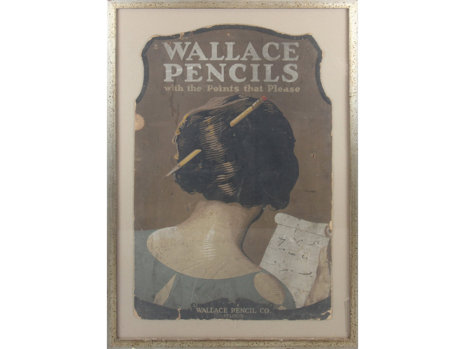 Wallace Pencil Co. Cardboard Advertising Sign: Die cut cardboard advertising sign for "Wallace Pencil Co.", St. Louis. Approx. 16" x 25". Shows condition issues with tears, creases, surface scuffing, tack holes, etc. Framed under glass, overall ap