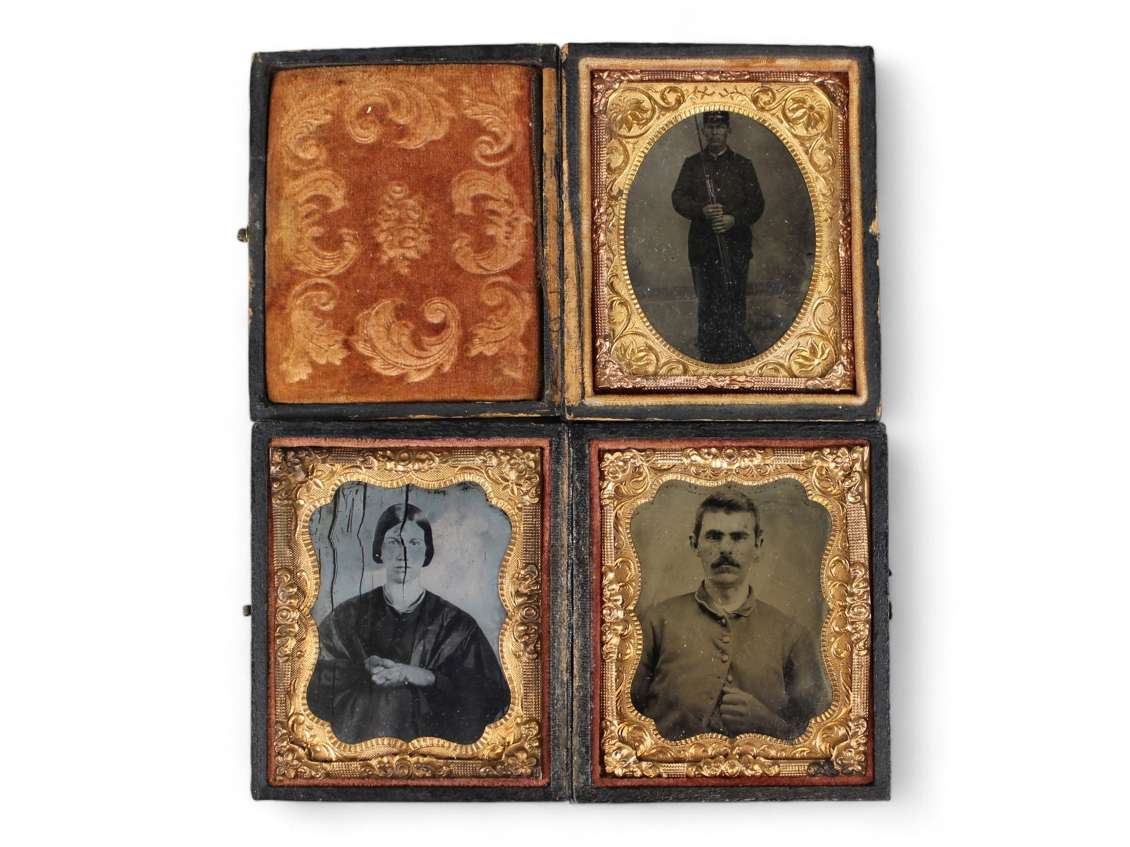 (3) Civil War Era Images: Includes tintype of soldier holding rifle with bayonet, another tintype of a man, and early glass image of a woman. Cases show wear, and detached along spine.