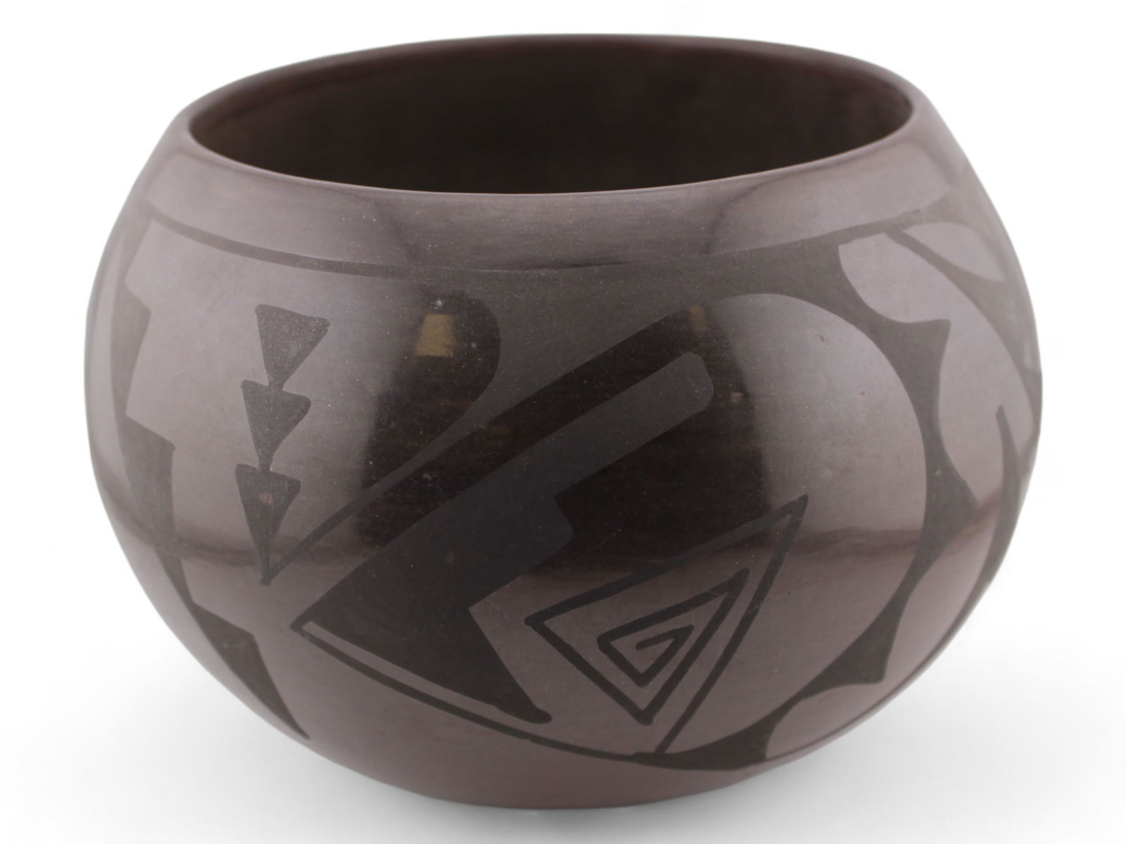 Carlos Sunrise and Carmelita Dunlap. San Ildefonso: Blackware Pottery Bowl.6 1/4" tall 7" diameter. Signed underside.