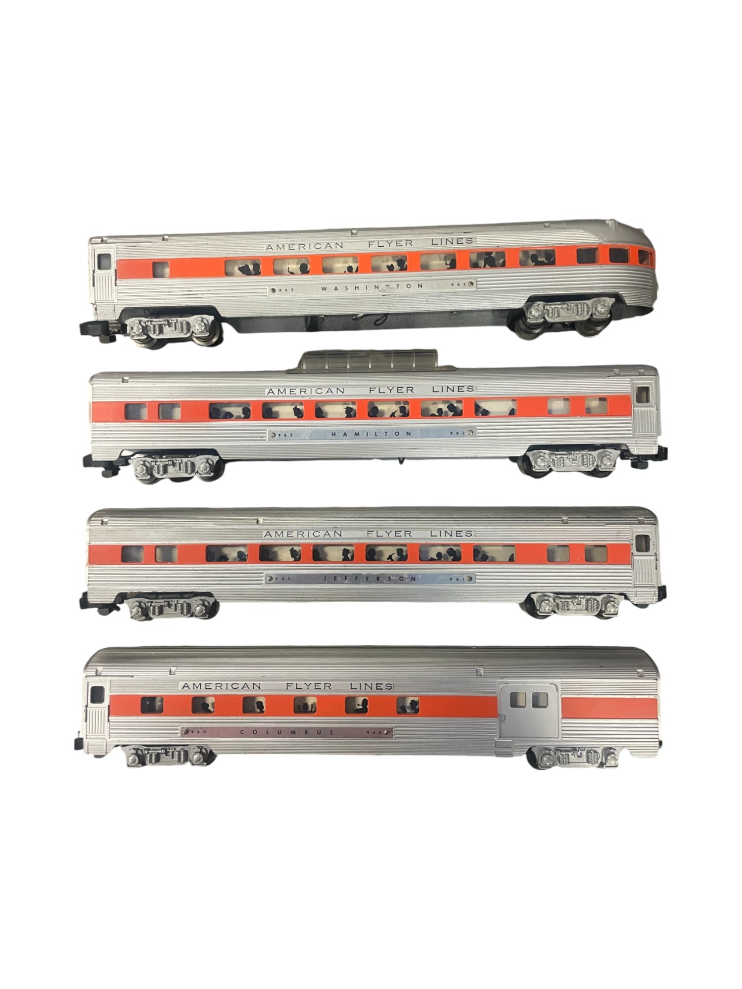 4 American Flyer NH Passenger Cars: S Gauge. Includes orange striped 960 Baggage; 961 Coach; 962 Vista-dome; 963 Observation. All would benefit from a cleaning and show light to moderate play wear.