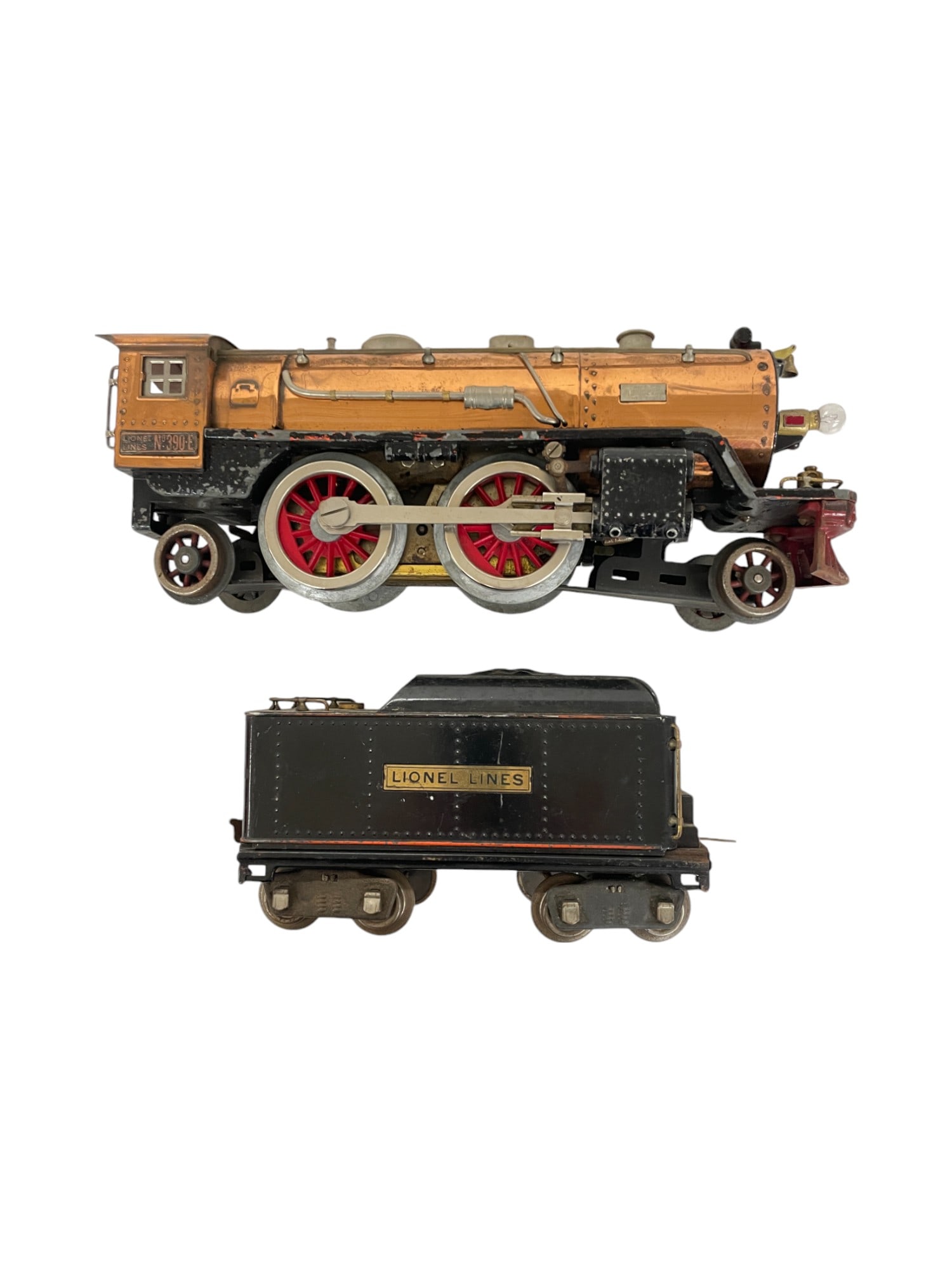 Lionel 390E Steam Locomotive: Standard Gauge. We don't know why, but copper plated boiler, frame is intact, but 50% paint, rewheeled; 390T tender in need of a cleaning.