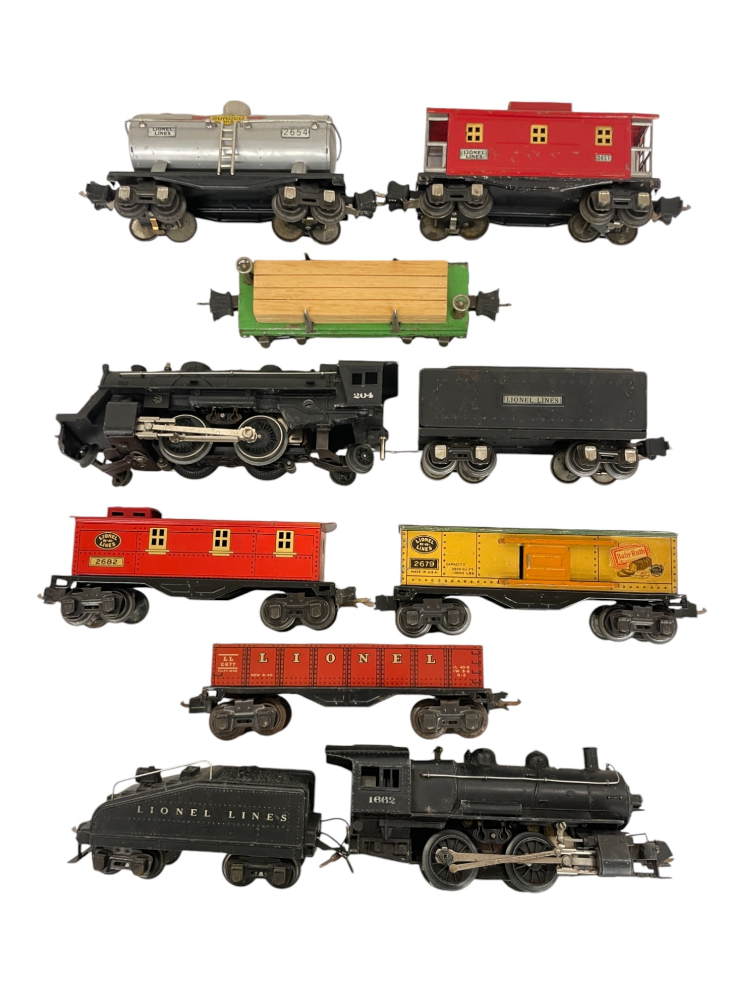 2 Lionel Steam Freight Sets: Includes a 1662 Switcher, no running lights; 2203T slant back tender with light; 2679 Boxcar; 2677 Gondola; 2682 Caboose, all show moderate play wear; 204 Steam Loco; 2689T tender; 2651 Lumber, solid