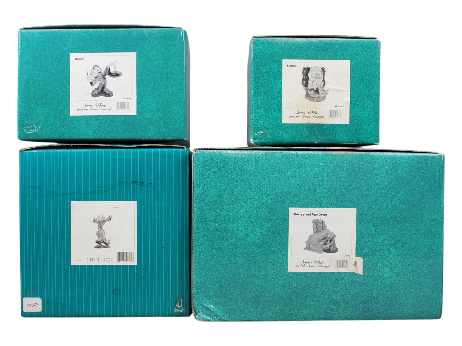 WDCC Disney Classics, Snow White (4) Pieces: Includes: Sleepy, Dopey, Dopey & Sneezy - Dancing Partners, and Grumpy & Pipe Organ. Each piece comes in the original box with COA's. Figurines may have some crazing. Boxes to each may show some wear