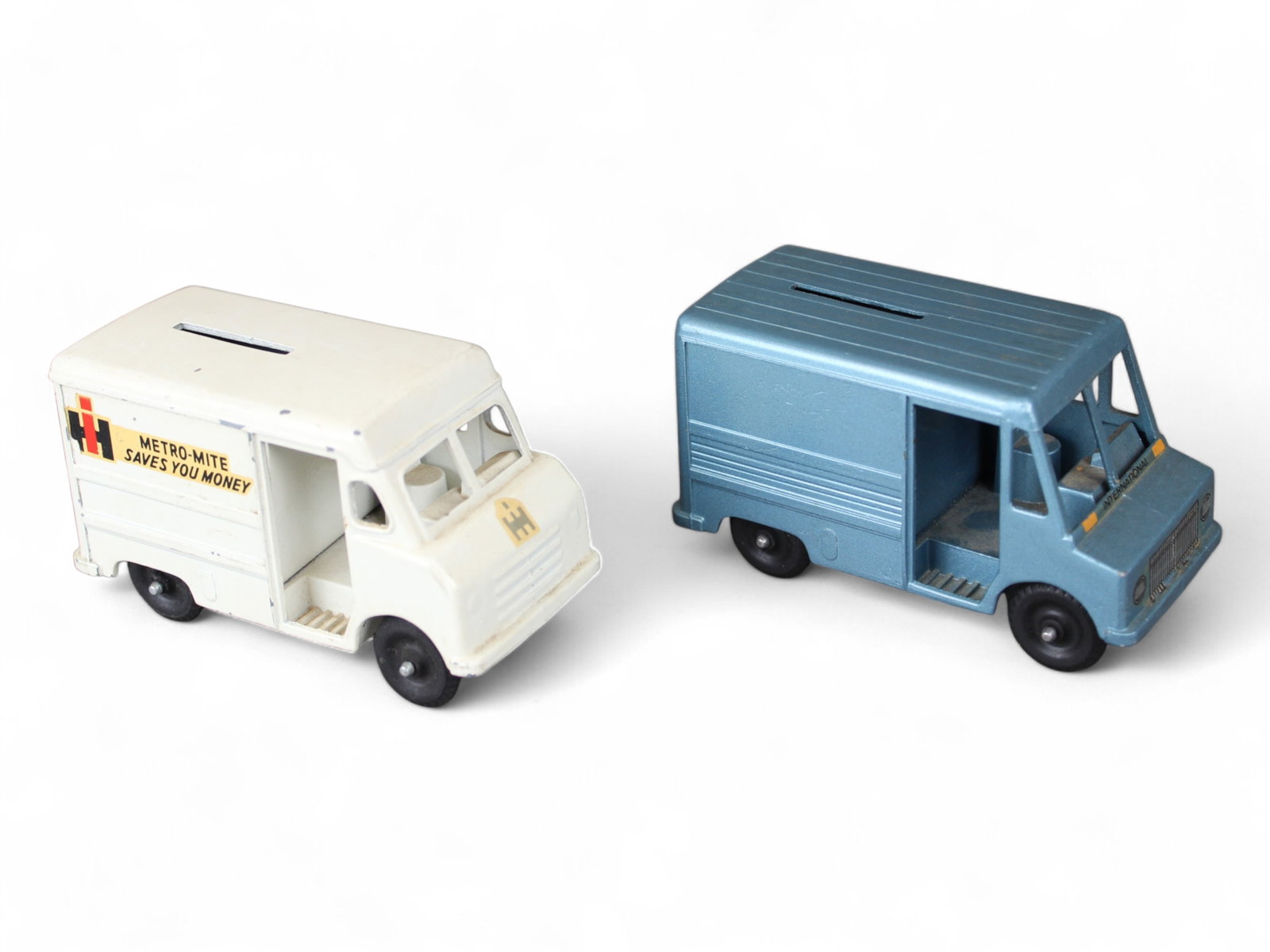 Lot of Two Commercial Van Still Banks: Includes Metro-Mite Saves You Money and International Blue Van.