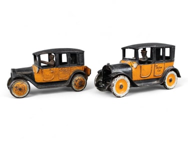 Arcade and Freidag Cast Iron Yellow Cabs