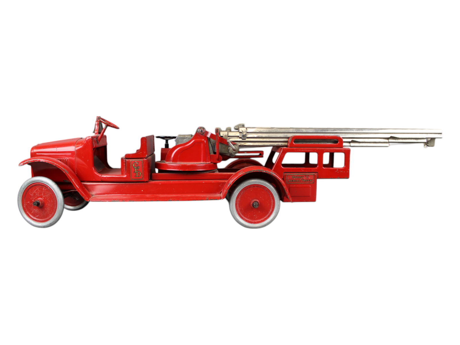 Buddy L Aerial Truck: Buddy L Aerial Truck; mechanisms work but ladder lock has a slightly weak grab. Some paint loss. Approx. 41'' long.