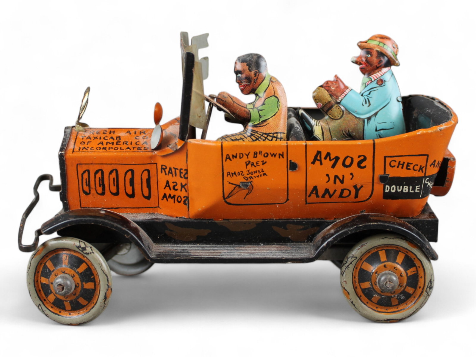 Marx Tin Litho Amos & Andy Fresh Air Taxi: Marx Tin Litho Amos & Andy wind up Fresh Air Taxi. Wind up mechanism works. Andy is detached from the tab in the back seat.