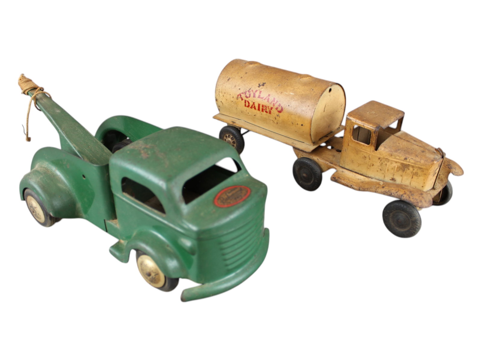 (2) Pressed Steel Toys- Richmond & Girard: Richmond Toys pressed steel tow truck, approx. 12'' long, and Girard pressed steel Toyland Dairy truck, approx. 11 1/2'' long.
