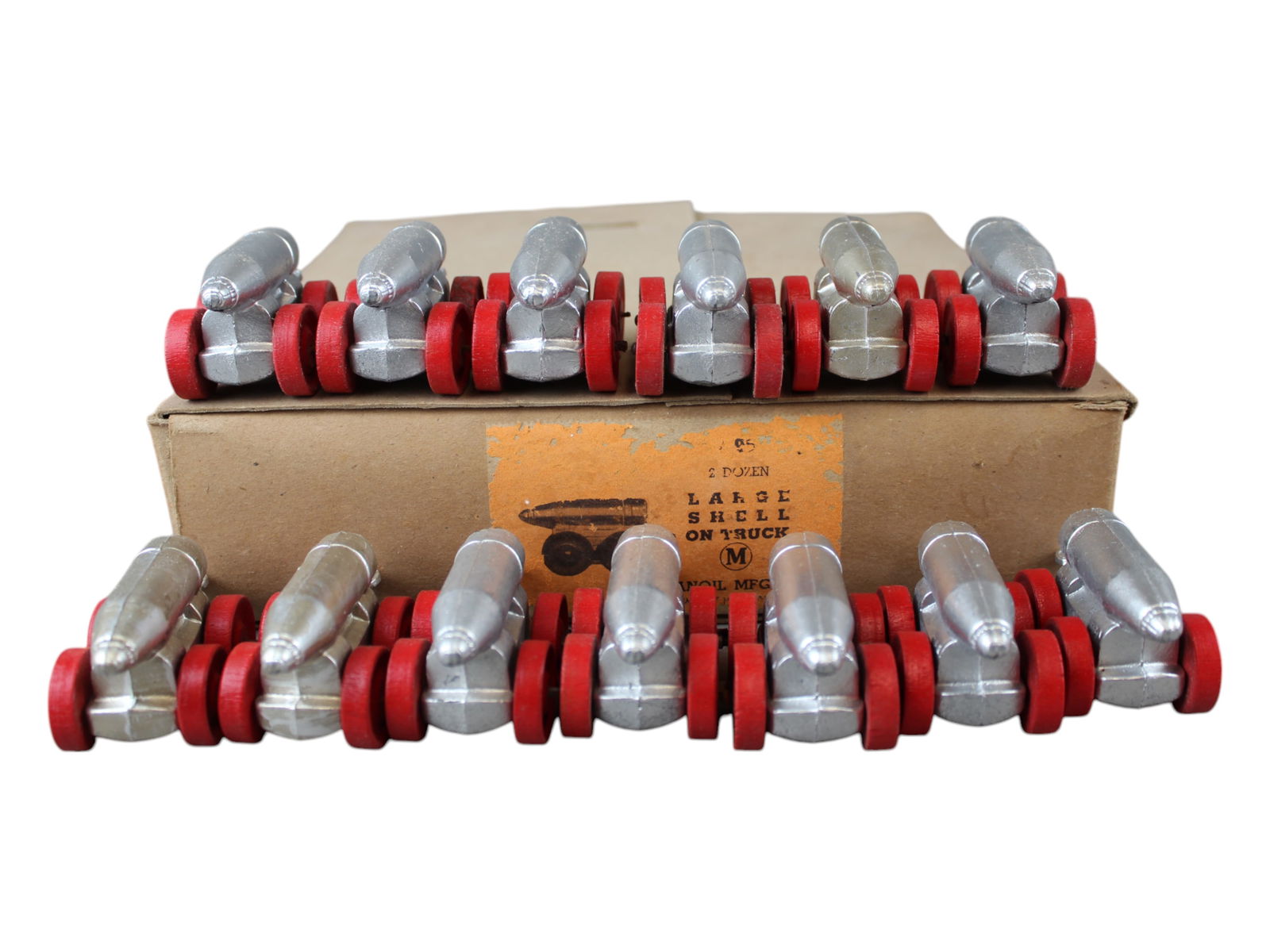 Manoil Factory Case 96 Large Shell on Truck: Store stock partially full factory case Large Shell on Truck, 13 pieces, with original label on box (partially worn). From the Jack & Maurice Manoil Family Collection.