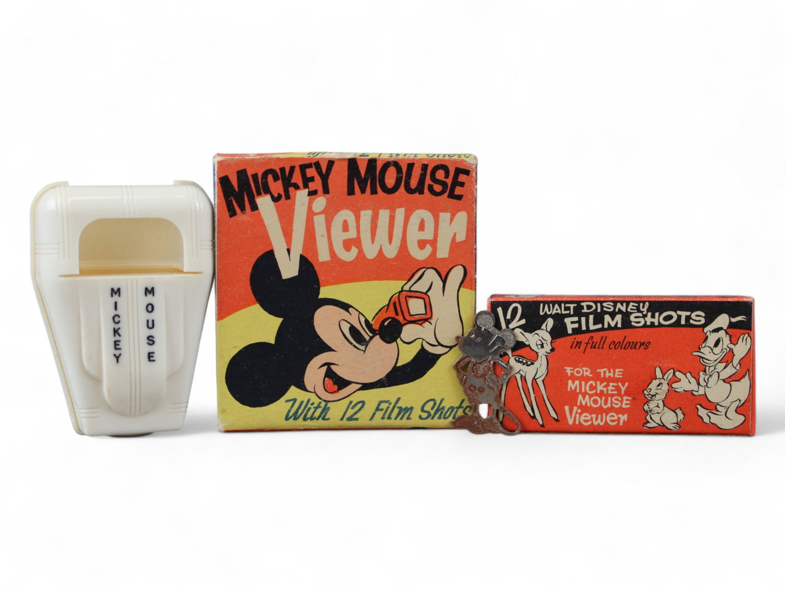 Mickey Mouse Viewer in Box 1950's UK w Films: Mickey Mouse Viewer in box, 1950s, UK, w "12 Film Shots' in separate decorated box within outer box, Walt Disney Mickey Mouse Ltd, white plastic viewer, mint in box.