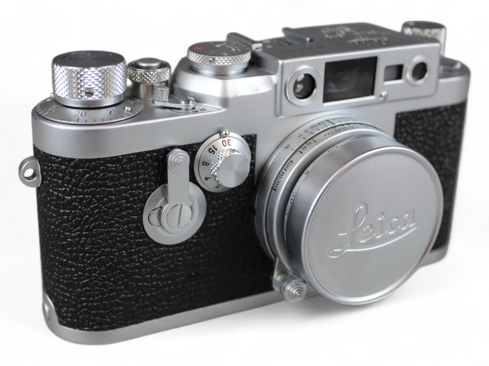 Leica IIIg & Elmar 2.8/50: Leica IIIg camera, serial number 881273, ca. 1957, with Elmar 50mm 2.8 lens, serial number 1494350. From single owner, lifetime Leica and photographica collection.