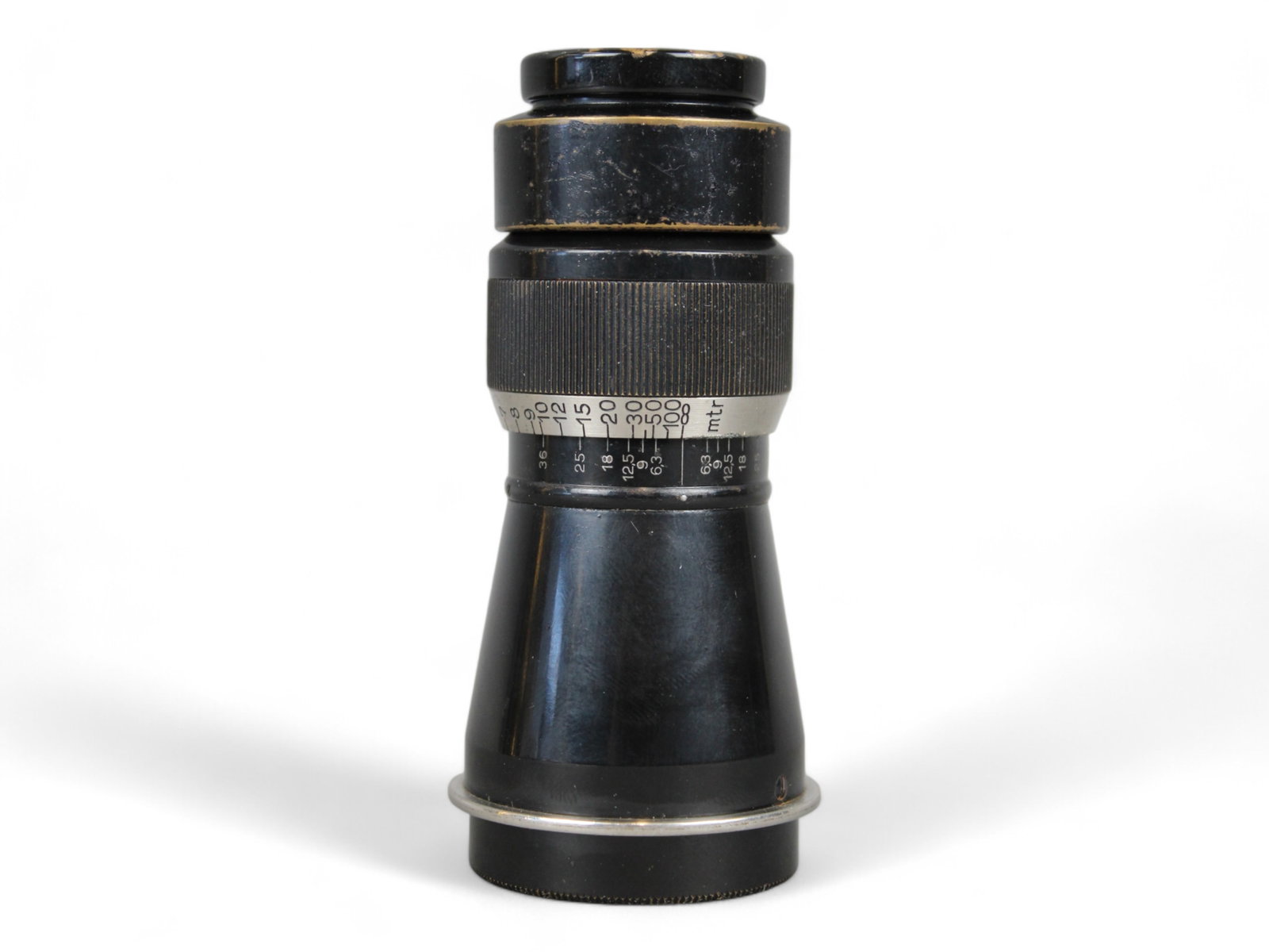 Leica Mountain Elmar 6.3/10.5 Lens: Leitz Mountain Elmar 6.3/10.5 len. Serial number 162398. 2 part lens cap. From single owner, lifetime Leica and photographica collection.
