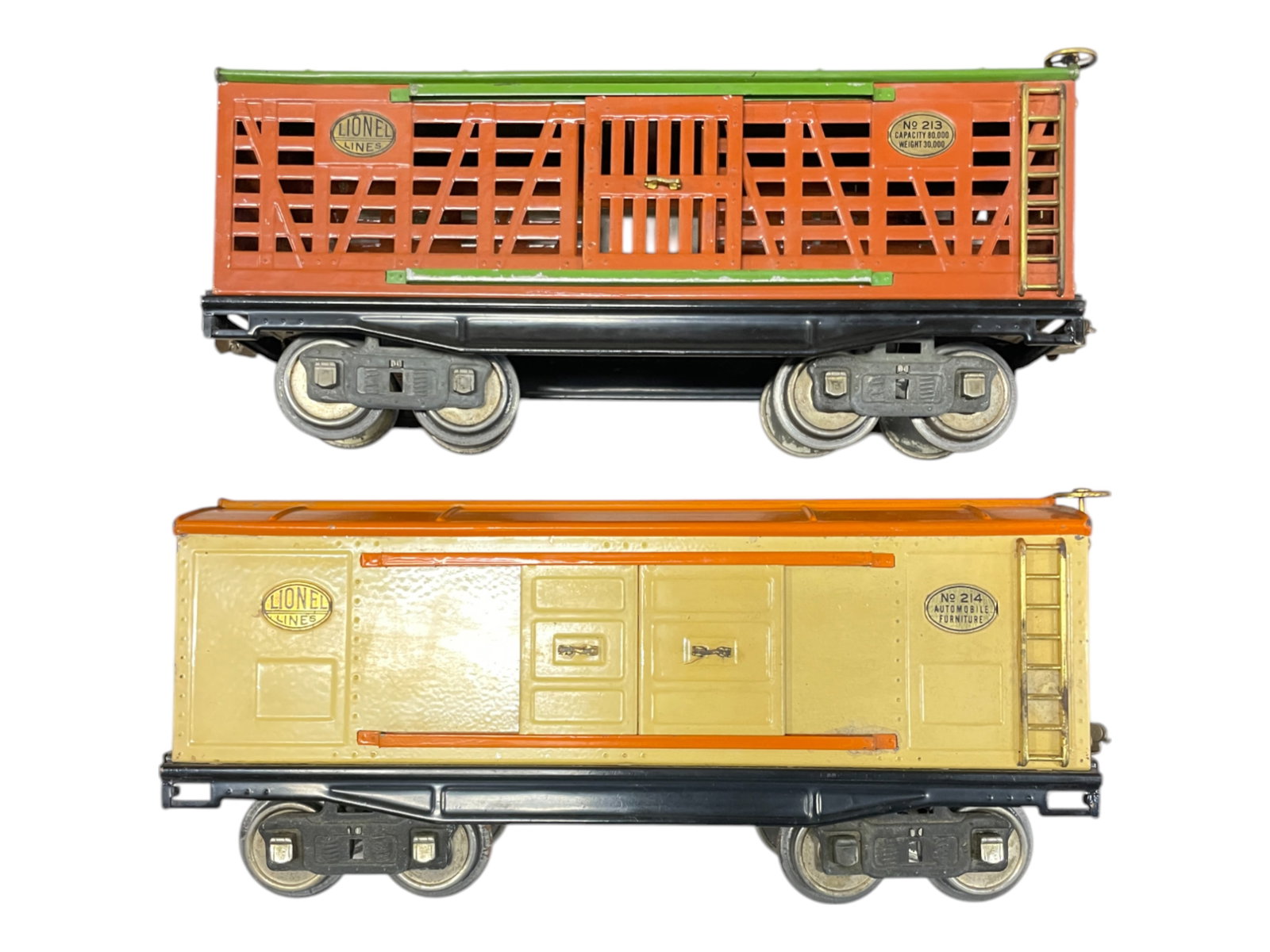 Lionel 213 & 124 Freight Cars: Standard Gauge. Includes a 213 Stock car & 214 Boxcar. Both are fairly clean and would polish up nicely, showing light play wear.