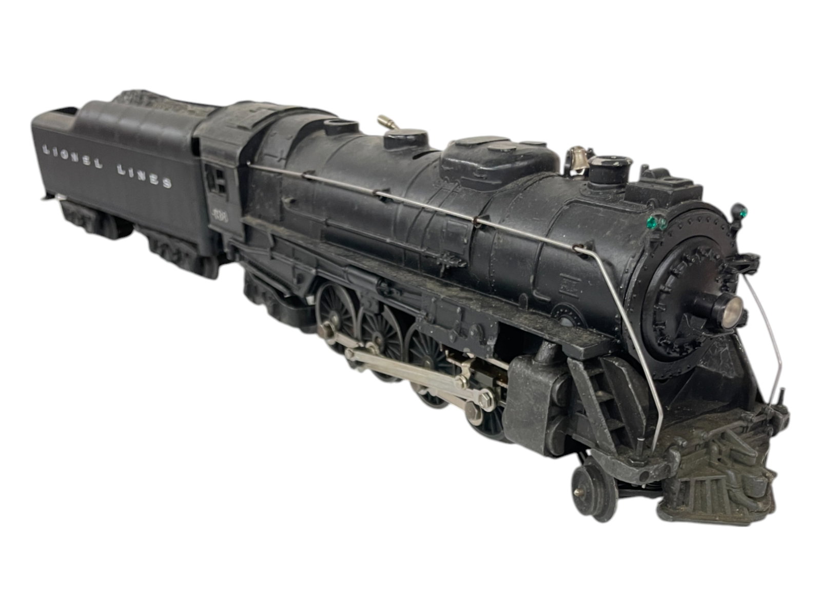 Lionel 736 Berkshire: Early 1950s exemple with metal trail truck. Nice rods and lettering; Incorrect 2671W whistling tender with 2046 shell. They show light play wear.