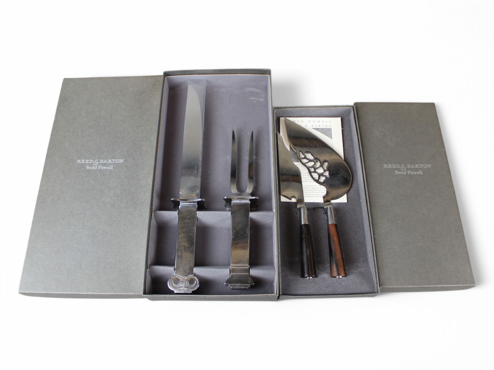 Swid Powell Reed & Barton Carving & Dessert Set: Includes Robert Venturi for Swid Powell Reed and Barton Carving Set, and David Palterer for Swid Powell Reed and Barton Dessert Serving Set. The carving set consists of a knife (12-7/8" long) and fork