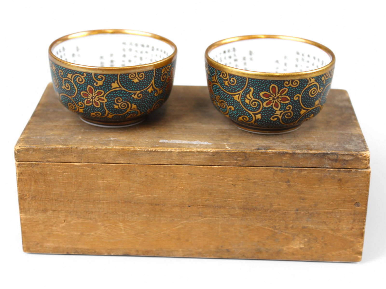 Pair of Japanese Kutani Porcelain Sake Cups: 19th Century. Approx. 1-7/8" diameter x 1-1/8" high.From the Sandra Andacht Collection.