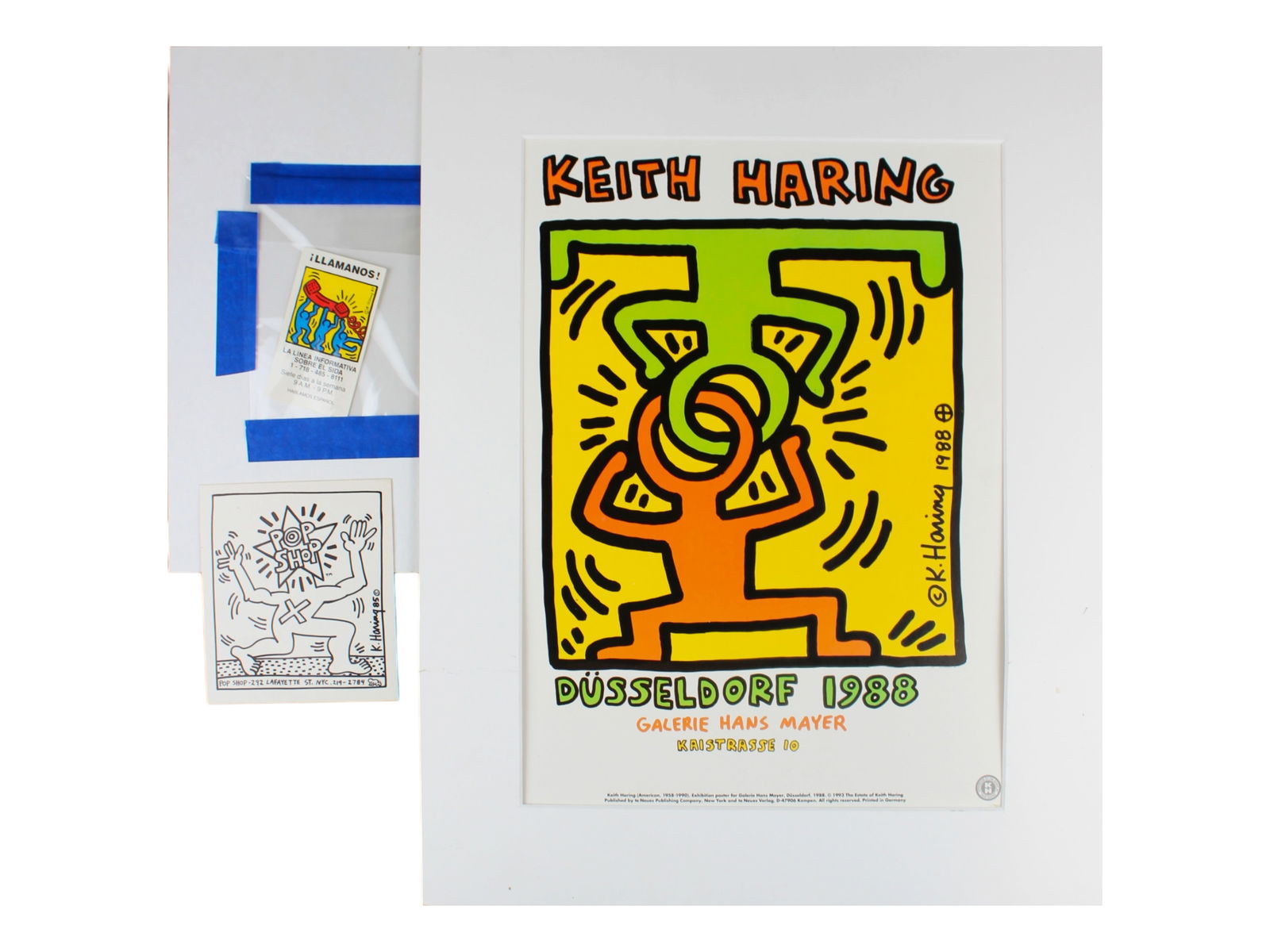 Keith Haring Lot of (3): Includes Pop Shop 4 1/2" x 5" Sticker, Keith Haring Business Card with Haring illustration and 11" x 15" Haring Dusseldorf 1988 Poster.This lot is being offered for sale on behalf of the New York Coun