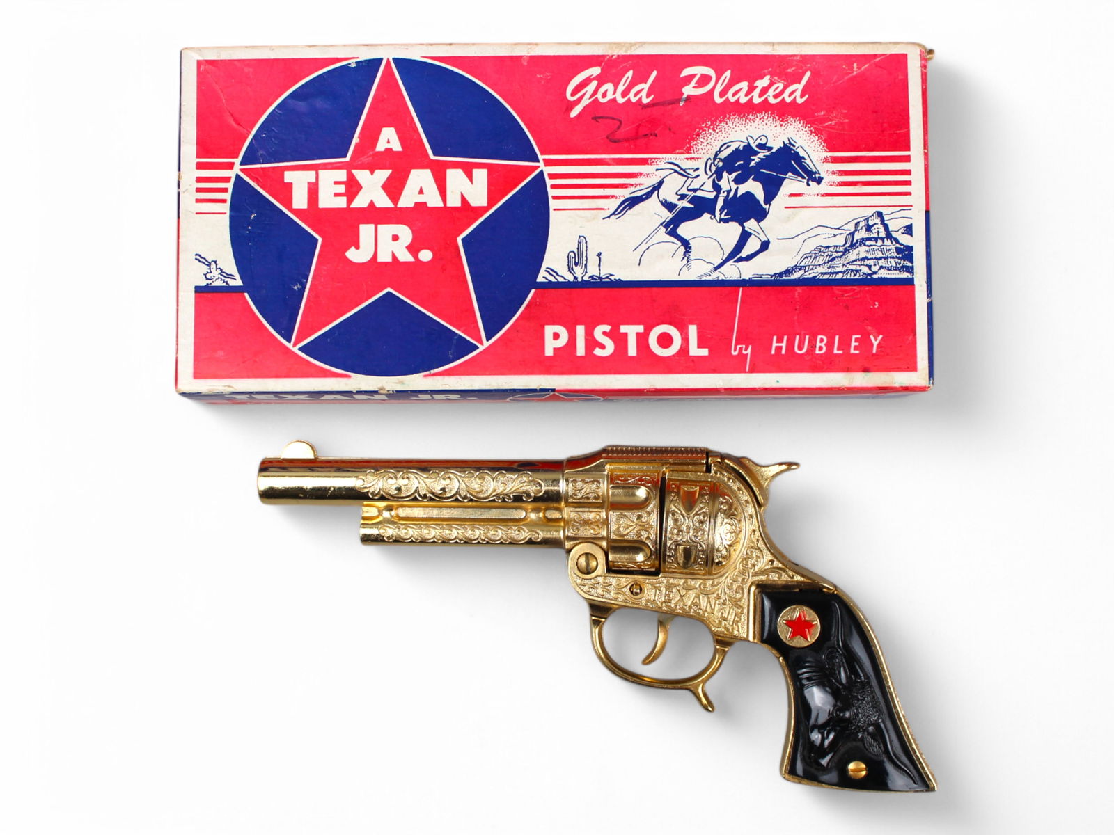 Hubley Texan Jr Cap Pistol: In Complete Box. Gold with Black Grips