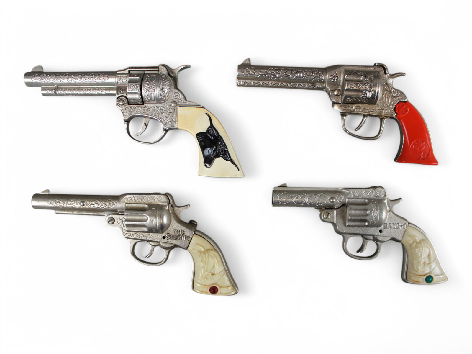 Vintage Cap Gun Lot of (4): Includes Texan Jr, Bang-O, The Sheriff & Kilgore Red Grips.