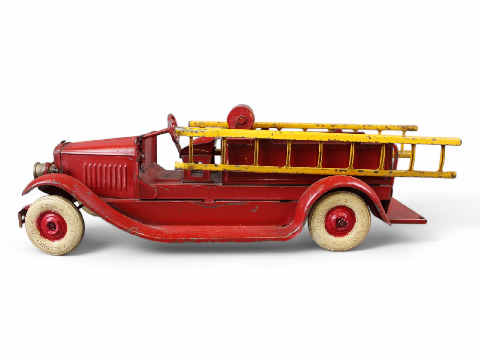 Kingsbury Toys Motor Driven Fire Ladder Truck: Kingsbury Toys motor driven fire ladder truck. Approx. 14'' long. Worked when tested.