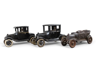 (3) Cast Iron Cars