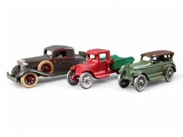 (3) Cast Iron Vehicles