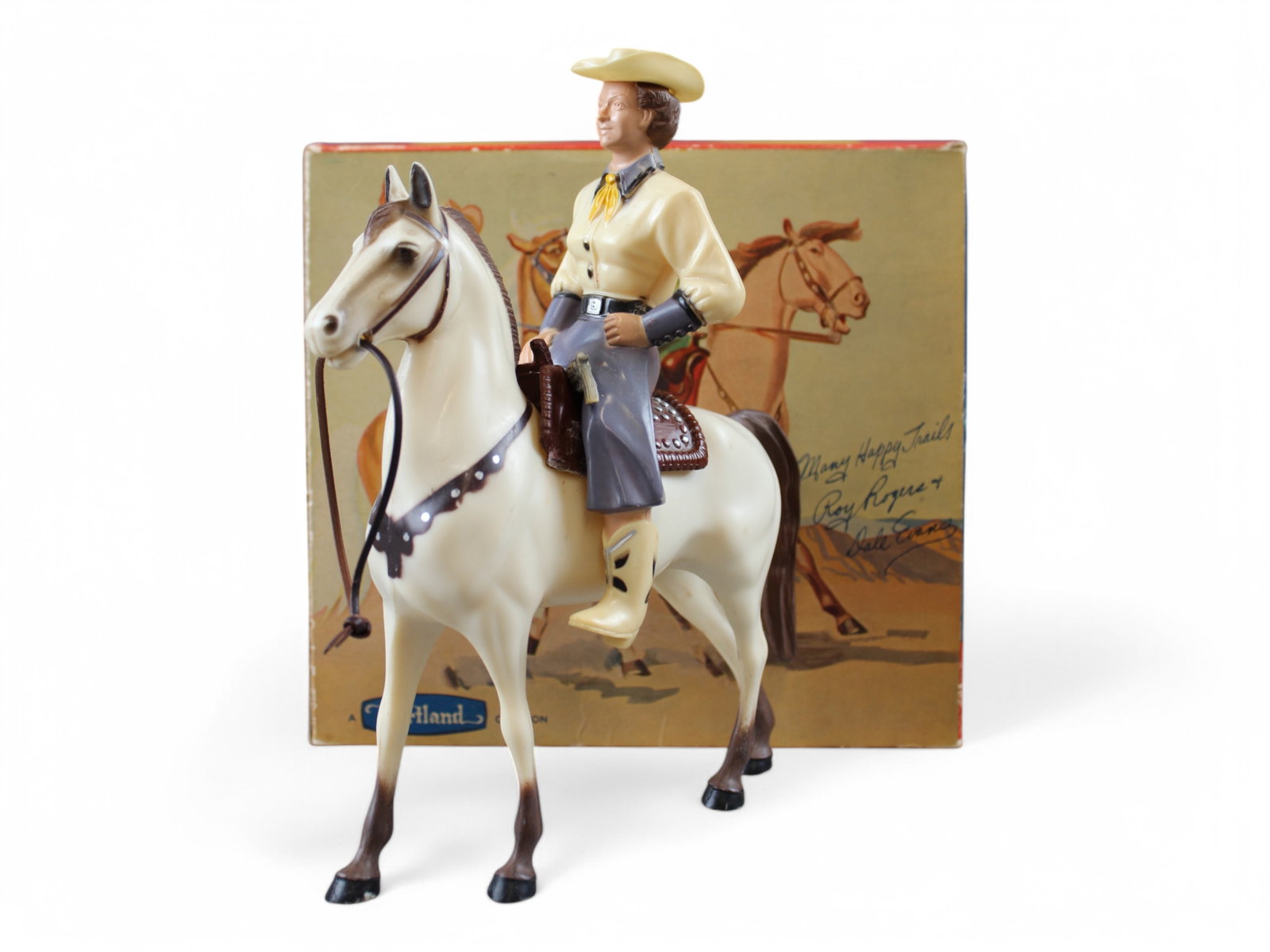 Hartland Dale Evans & Buttermilk w/ Orig Box: Vintage 1950's, "Dale Evans and Buttermilk" by Hartland in Original Box, Figure #802DE. Includes figure with hat and pistol, and horse with reins and saddle. The saddle is damaged with a piece broken 