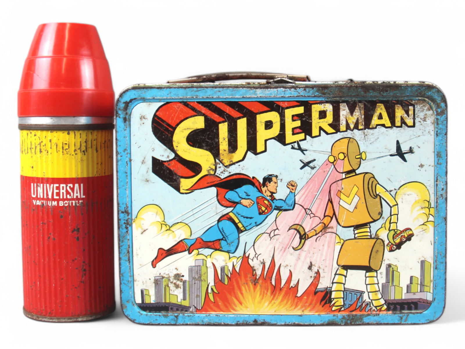 Superman vs. The Robot Metal Lunch Box: Box is fairly rough but the graphics are clear with most of the rusting and pitting on the outer sides and edges. Has a cone top thermos with no graphics included. See images for details.
