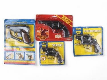 Lot of 4 Mint on Card Cap Guns