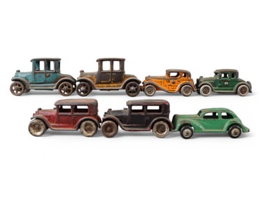 Lot of (7) Small Cast Iron Cars