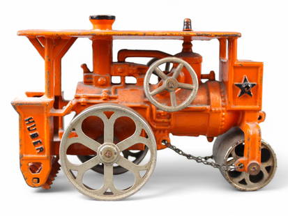 Hubley Huber Cast Iron Steam Roller.: Hubley Huber Toy Steam Roller Tractor - Orange Painted cast iron w/ original paint, 7 3/4" W x 5" H. Lacking stand-up driver.