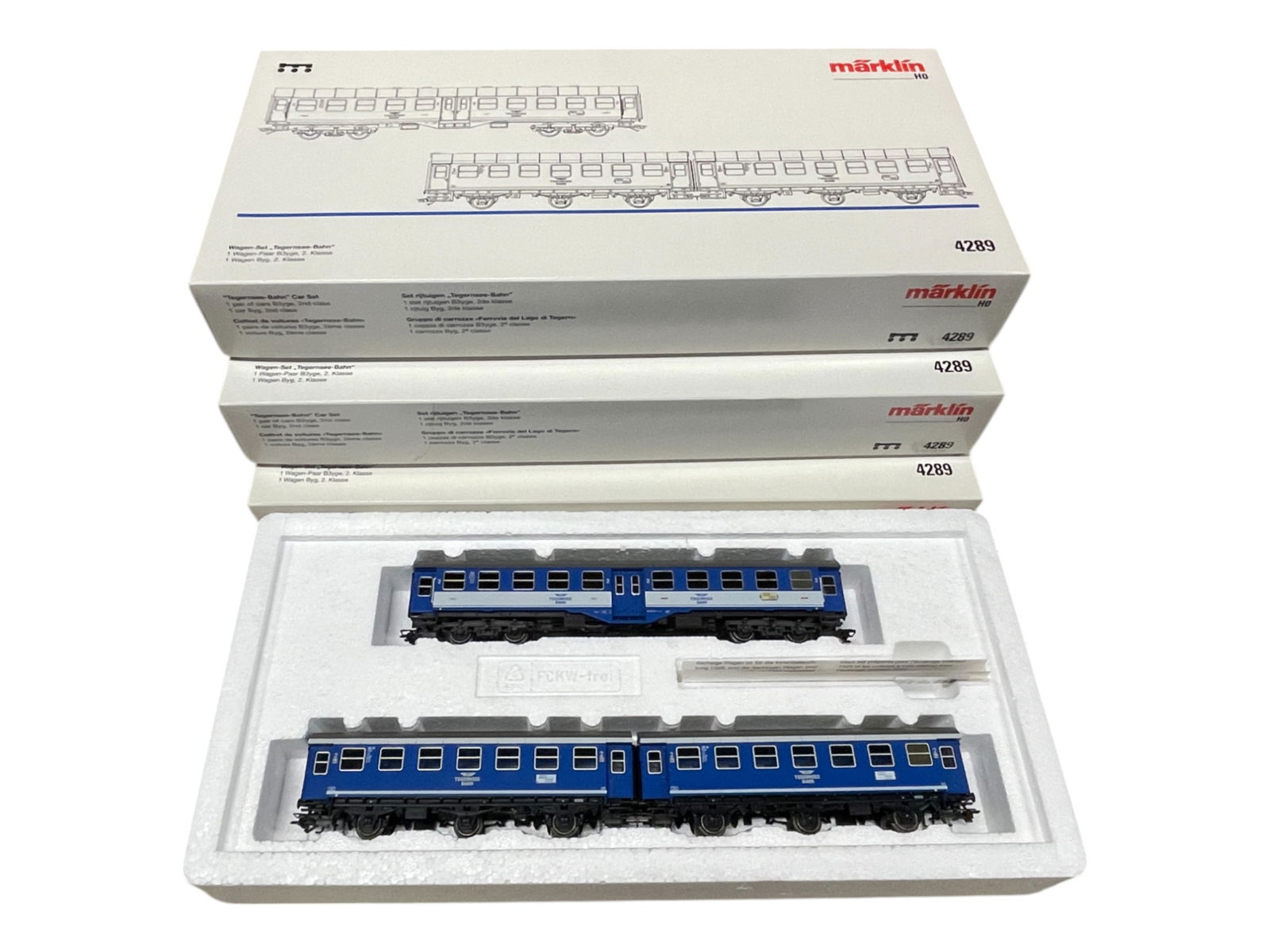 4 STORE STOCK Marklin HO 4289 Tegernesee: All are nice 3-car sets with 8-wheel coach and 2-6-wheel cars. They are factory new in boxes.