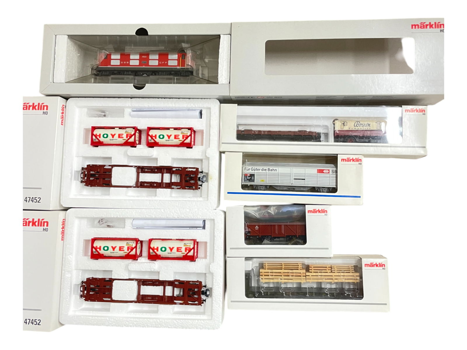 7pc Marklin Digital HO Swiss Goods Train: HO Gauge. includes a 39421 Serie Re 4/4 1 Electric with sound, mfx control and soft drive; with 2-47452; 46361; 4834; 46282 & 46035. All appear new in boxes.