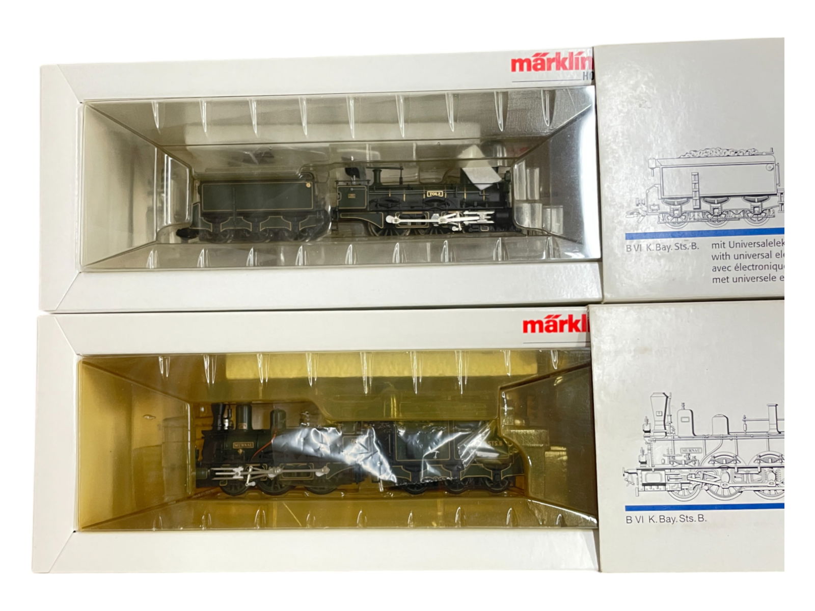 2 Marklin HO 19th Century Steam Locos: HO Gauge. Includes a 34971 & 3491 B VI K.Bay.Sts.B. 2-4-0. They appear new in boxes.