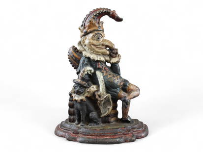 Punch Cast Iron Door Stop: 12" Tall vintage Punch Door Stop with original paint.