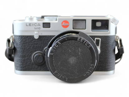 Leica M6 Camera & Summicron: Leica M6 Camera, Chrome, serial number 2009845, with Summicron 2/50mm lens, serial number 3592691. Not serviced. Some minor wear,