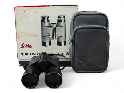 Leitz Trinovid 7 x 35 Binoculars in Box: Leitz Leica Trinovid 7x35 Binoculars in original box. Serial number 653227.