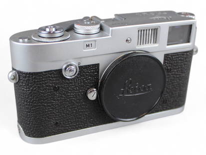 Leica M1 Camera: Leica M1 Camera, serial number 966699, ca. 1959. Small spots of wear/pitting.