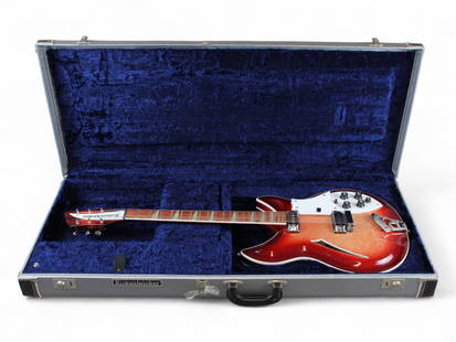 Rickenbacker 381/V69 Fireglo Electric Guitar: Rickenbacker 381/V69 Fireglo 6 String Electric Guitar in original case. Serial number L84607 (1995). With original manual and warranty card.