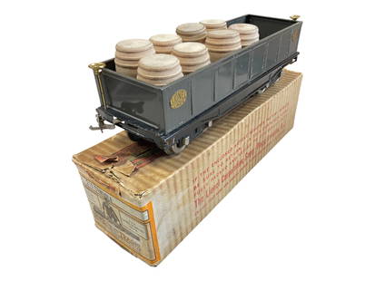Super Boxed Early Lionel 212 Gondola: Standard Gauge. 1927. Gray painted with 8 split barrels. It is clean and very shiny, showing almost no signs of wear with square label-end box. WOW!