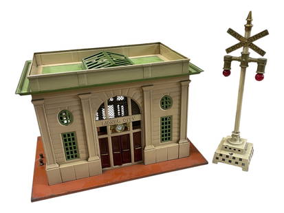Lionel 79 & 113 Accessories: Standard Gauge. Includes an early 113 City Station with original vent cover; 79 Flasher, casting intact for a change. They show light to moderate play wear.