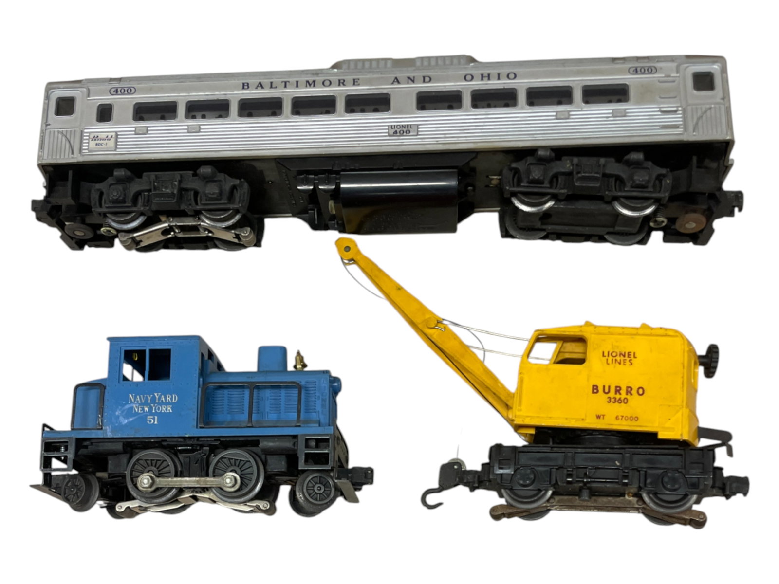 Lionel 51, 400 & 3360 Powered Units: Includes a 400 RDC1 Budd Diesel, clean battery box; 3360 Burro Crane, boom intact; 51 Navy Switcher, 1 cracked strut. All would benefit from a good cleaning.