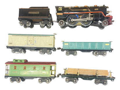 6pc Lionel 390E Freight Set: Standard Gauge. Includes a 390E steam Loco with warp to frame, but appears to track. Late original wheels, turn freely, several handrail stanchions loose; 390T tender; 511 Lumber car, original load; 5