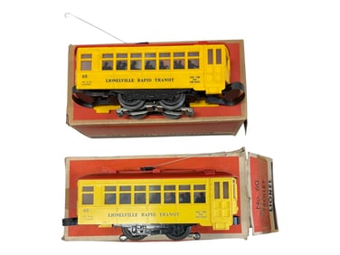 2 Different Boxed Lionel 60 Trolleys