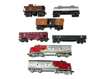 7pc Lionel 2343 SF Freight Set: Includes a 2343 SF F3 AA Diesels, usual decals wear at door guides, dual motors with light & horn; missing some port hole lenses, showing moderate play wear, may clean a little, batterybracket appears