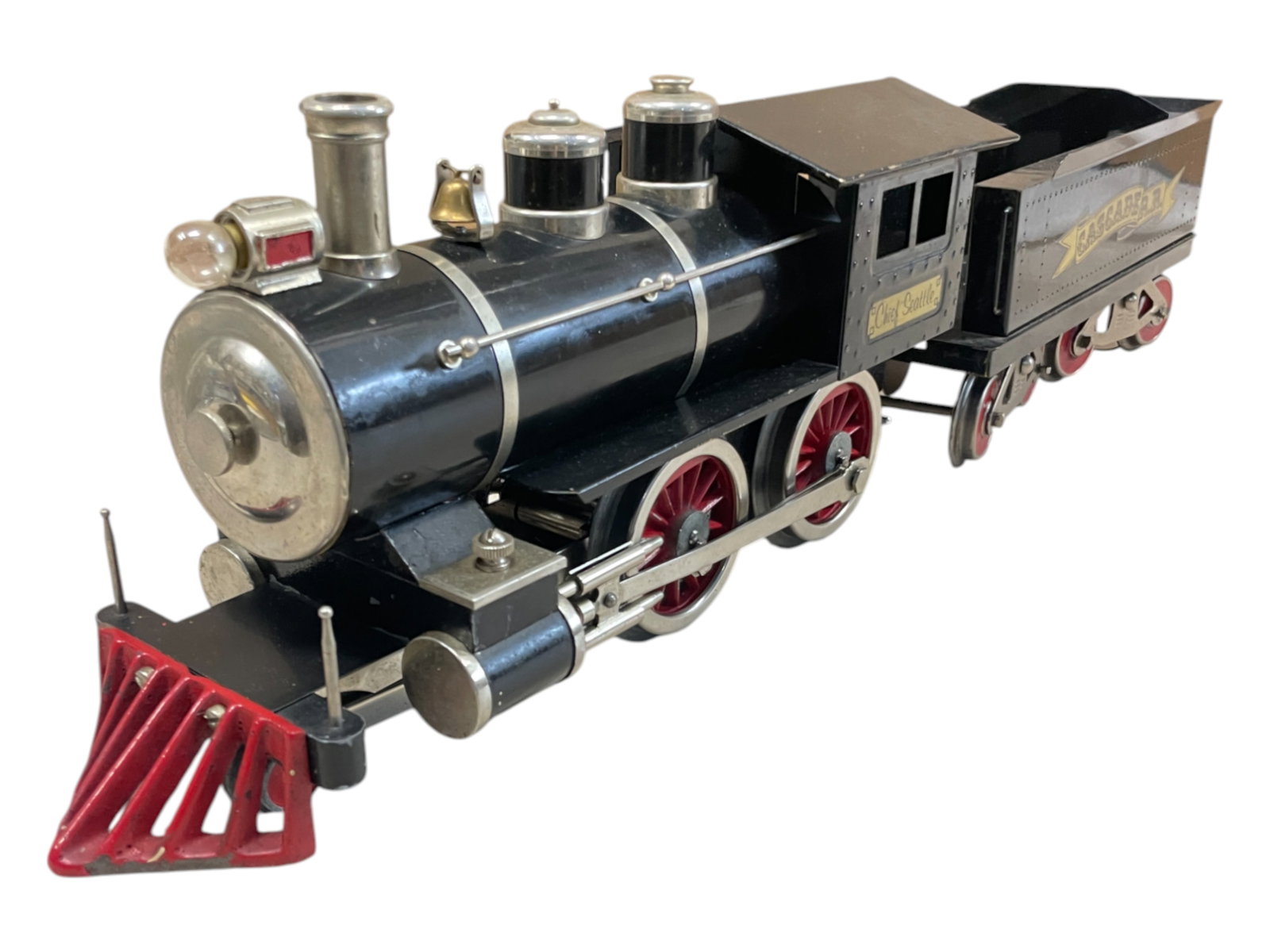 McCoy Chief Seattle Steam Locomotive: Standard gauge. Nice and clean, 4-4-0 steamer with good wheels that turn freely. Shows light use. From The Estate Collection of Joel Cane.