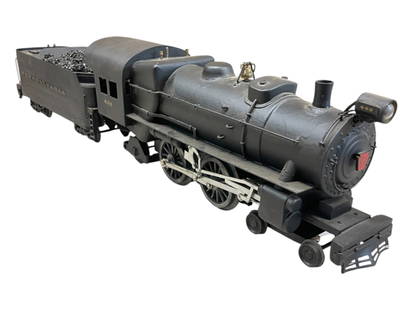 Super Custom Standard Gauge PRR Atlantic: Standard gauge. Serious thought went into this unit! It is brass, wood and sheet metal. This 4-4-2 has a Lionel based Super motor with modifications. Wheels turn freely. Rods arecomplicated and in-cab