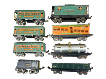 8pc Lionel Prewar Cars: Includes am 812 Gondola with postwar drums; 813 Stock car; scarce 815 Sunoco Tank, 1934 only with copper trim; 817 caboose shows moderate play wear; 262T cast tender; 2-607 Pullmans; 608Observation. R