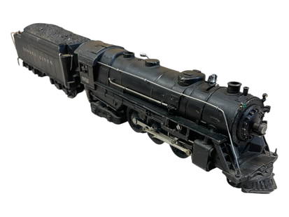 Lionel 226E Hudson Steam Locomotive: 1939. 226E Hudson, nice rods, very slight tweak to cab corner; 2226WX cast whistling tender, 39 coupler. They would benefit from a cleaning and otherwise show light to moderate play wear. FromThe Esta